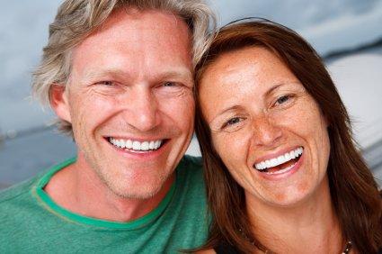 An image of two people smiling